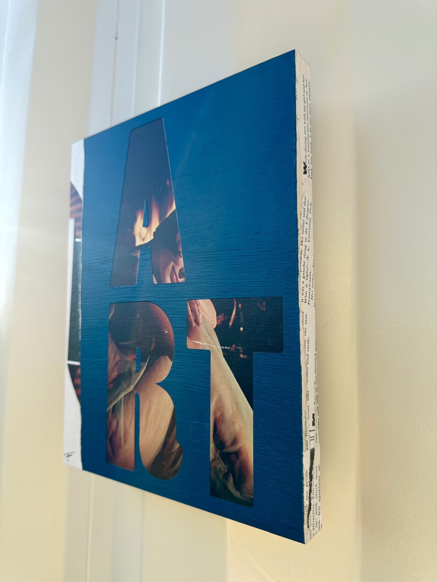 Right side of ART: Dark Teal, a collage made of acrylic and vintage magazine paper on wood panel