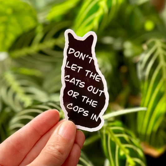 "Don’t let the cats out or the cops in" Sticker